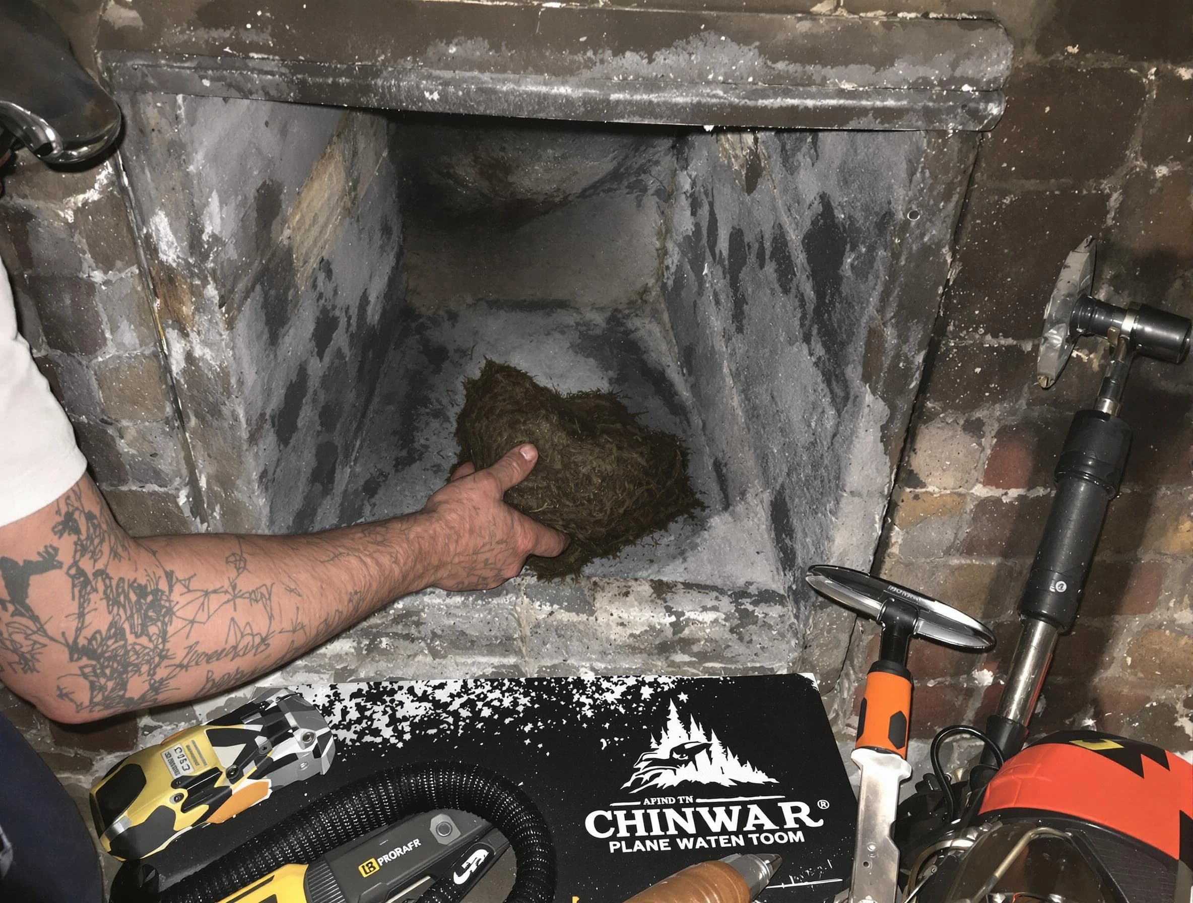 Chamblee Chimney Sweep safely removing debris and screening chimney in Chamblee, GA